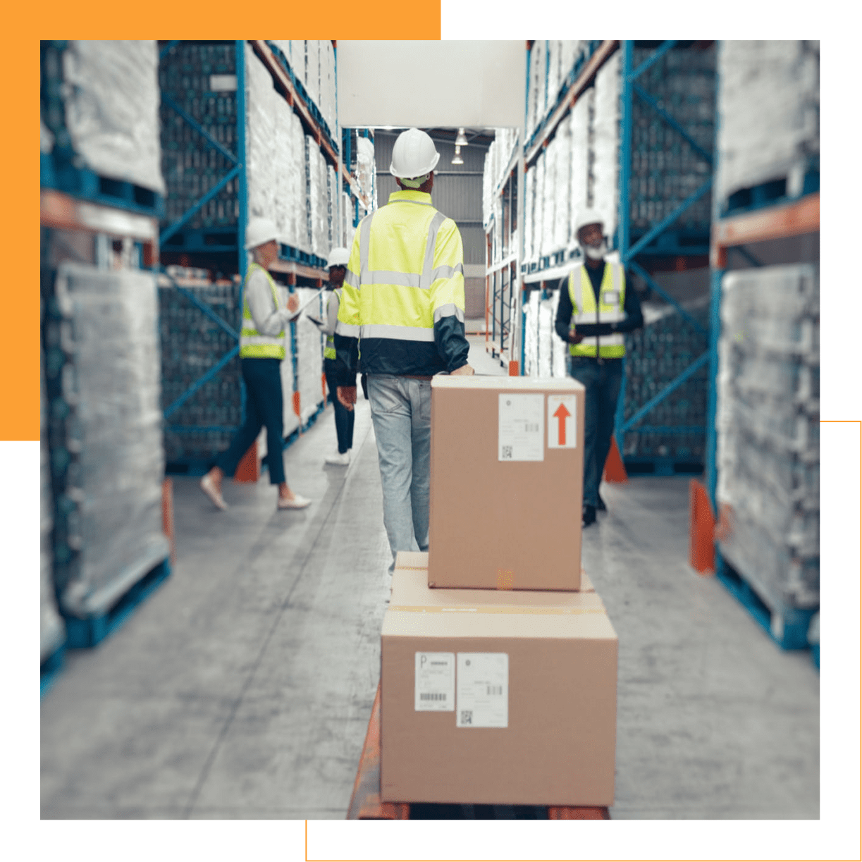 Warehouse workers moving boxes on pallets.